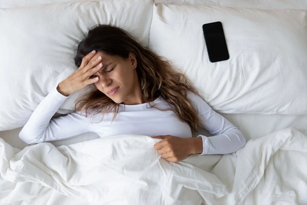 6 Reasons You’re Waking Up With A Headache